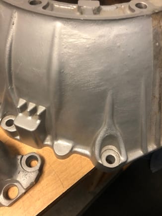 This is a clear ceramic coating specific for magnesium that allows for off-gassing. My manifold is just visible in the left.