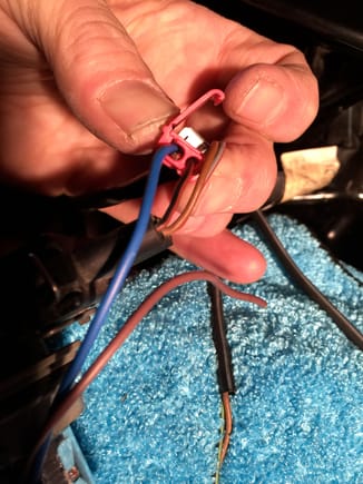 Splicing red/black back together with blue wire.  Be sure to get wires all the way in and snap SIDE of splice box closed before squeezing splice