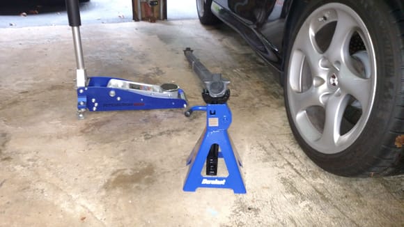 Liftbars, only used rear jack stands... the Harbor Freight speed jack is barely high enough with hockey puck.  My Craftsman jack goes up higher.  I highly recommend Liftbars.