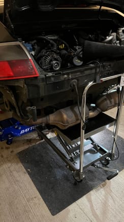 For lowering the engine and transmission I have the lift table under the engine and a jack under the trans. I found lowering it all a little bit helped with disconnecting the clutch slave cylinder. 