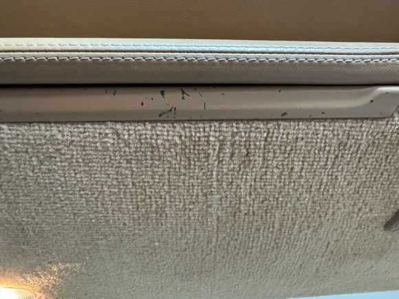 paint scrapes on driver door card. 
