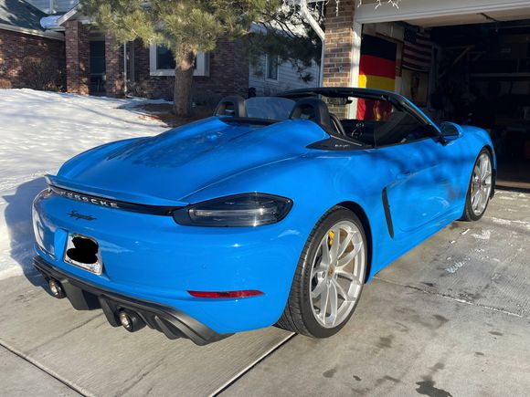 The car is covered in PPF.  I ordered it without the Spyder emblem because I knew I'd ppf the whole car.  This is the larger version off of the 981 series; the 982 series version is smaller.  Also visible here are the Akrapovic exhaust tips which I have attached to a Soul valved exhaust/Soul Resonated OAP.  The tips are normally too big at point of attachment for OEM or Soul exhaust but by using some thin aluminum flashing I was able to  attach them pretty easily.  They look awesome.