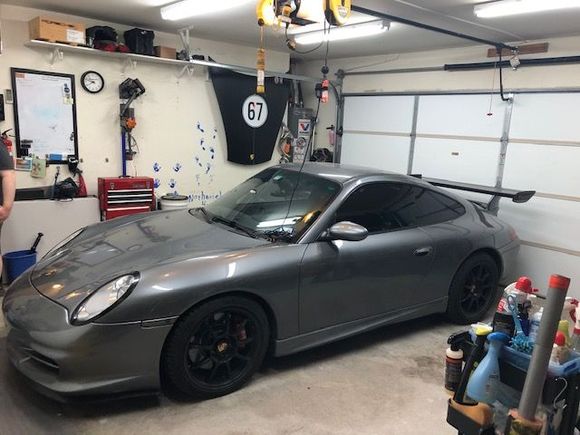 My car parked inthe garage on top of my QuickJack.