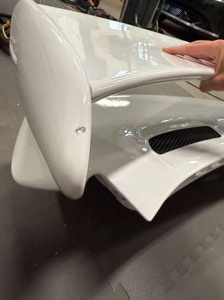 Chip on top of wing-end (passenger side)