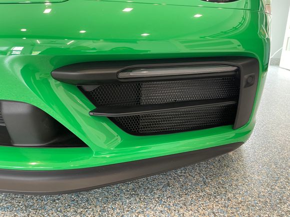 Radiator protection, OEM pattern and look with no bumper removal. 
https://www.radiatorgrillstore.com/product-page/porsche-911-992-gts-aero-kit-front-side-and-center-radiator-grilles