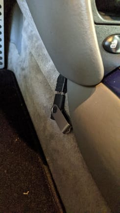USB stick in driver footwell
