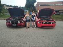 From L-R Our friend Carol next to her 2006 RedFire GT and my wife Cathy next to our 2006 TorchRed GT