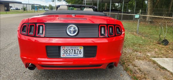 I purchased this deck lid trim piece. The OEM gloss, smooth type part just didnt look right with the lower