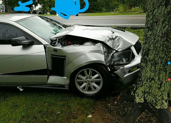 Long story short the rain was so bad i couldnt see so i tried to pull iver and wait it out but i hut a  ditch and my car kept sliding into the tree. The airbags didnt deploy so the cop determined i was going less than 15 mph yet this bad of damage was caused. So what i wanna know is does it look totaled?