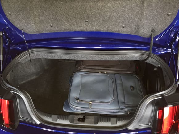 Two 21 inch Samsonite suitcases leaves loads of space, even with subwoofer.