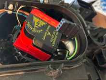 Igniter (red) and connector to it that goes to headlight pigtail.