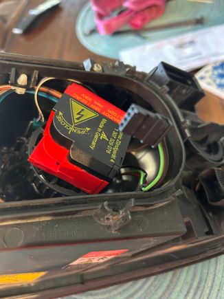 Igniter (red) and connector to it that goes to headlight pigtail.