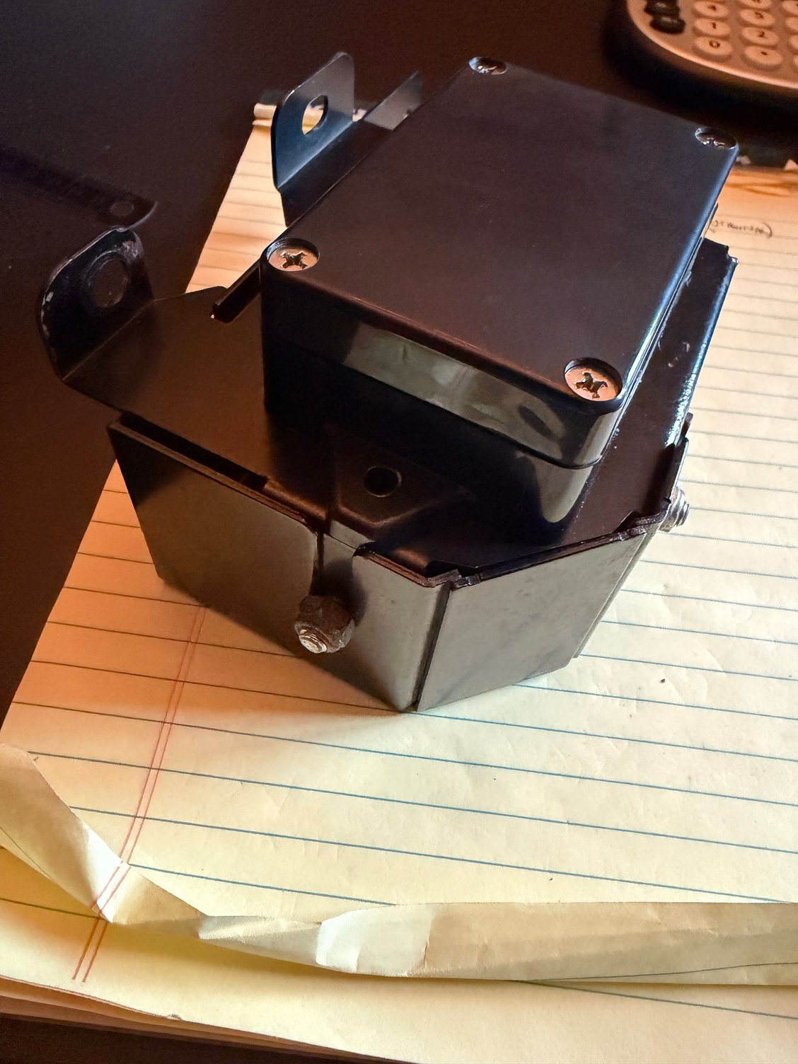 amazon box (battery inside) mounted to side of alarm box