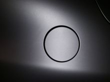 this color wrap is very interesting, it doesn't look so beige in person, definitely more silver, this is a picture of the gas door with a LED cell phone flash, and probably more of what it will look like in sunlight