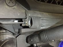 Chassis side of hood strut