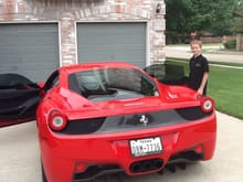 My grandson Caleb.  After we returned it and were driving home, at a stop light, my grandson said, "darn, I forgot we're not in the Ferrari anymore and I keep looking over at people like I'm awesome!"  I haven't laughed that hard in a while.