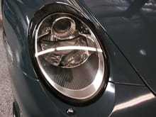Clear coated and installed carbon fiber headlight rings.