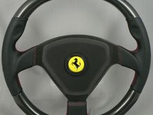 MAcarbon custom Ferrari 360 CS wheel, carbon top and bottom with gold stripe, and red stitching