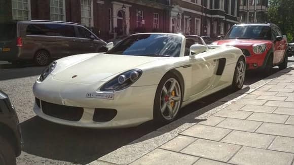 White Porsche Carrera GT from Saudi spotted in London. 
