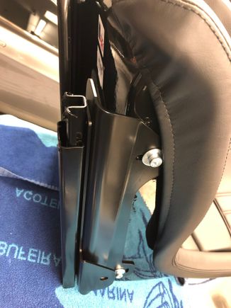 Spacer with seatbelt hole