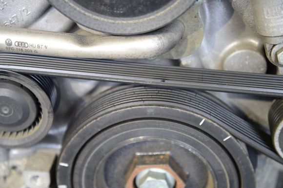After removing the radiator assembly, you may find you need to replace the serpentine belt like mine here in the picture