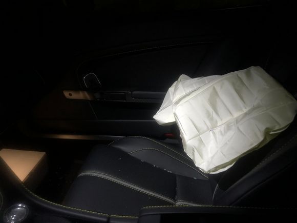 Passenger seat airbag, glass
