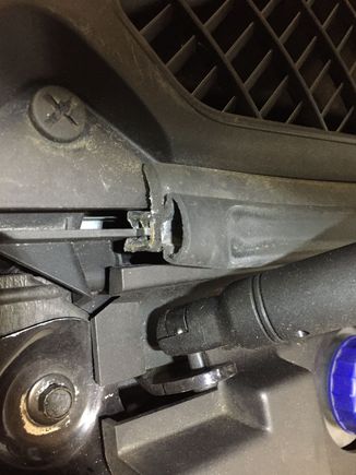 Chassis side of hood strut