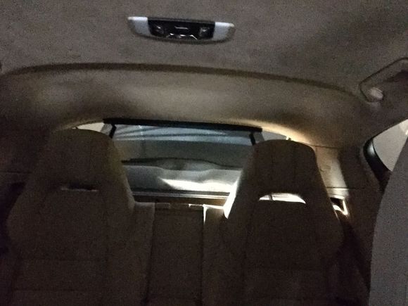 Sunblind fully deployed - it creates a very soothing environment for rear seat passengers and quality seems higher than in my Audi's