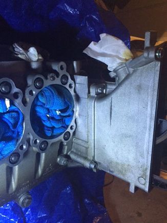 I had to remove the timing chains covers to get to the inside holes as the drill I had would not clear the chain covers. If you had an angle drill or really small drill you wouldn't have to do this.