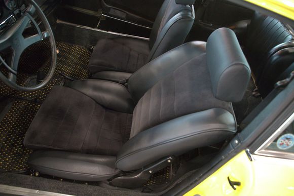 Sport Seats is a must-have upgrade...unless you have a REALLY strong back LOL