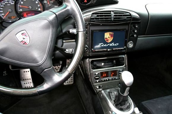 Thinking about having the head unit trim piece done in carbon fiber?