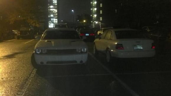 My car and a white bare bones automatic challenger