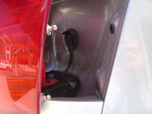 image005 Beside the 1 main screw each tail light has 2 prongs that keep assembly in place (removal technique is pull the tail light as straight back as possible care full not to lean off to the side, up or down bc that can damage the screw)
