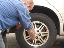 boyfriend checking my tire