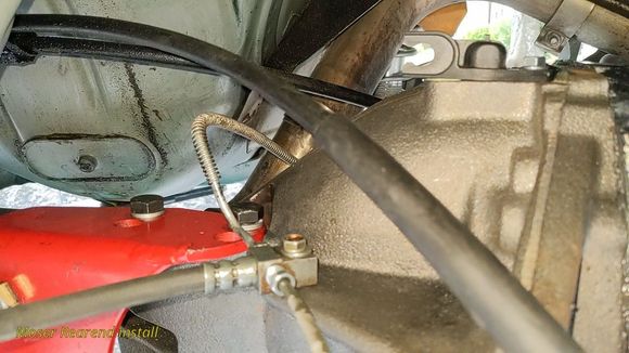 The top torque arm bolts