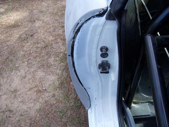 rear quarter panel attached to the inner skin