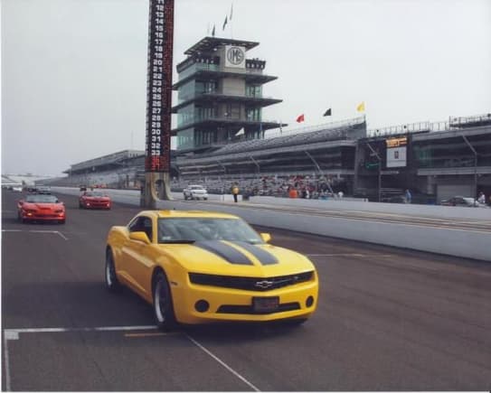 Indianapolis Motor Speedway, July 2011.  My Camaro on the front stretch with the pagoda (scoring tower) in the background.