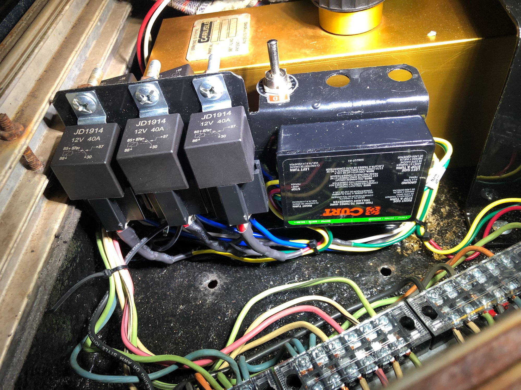 Control plate with converter, switch, switchbacks on the back. Front relays are to prevent backfeed into converter, with less voltage drop than diodes.