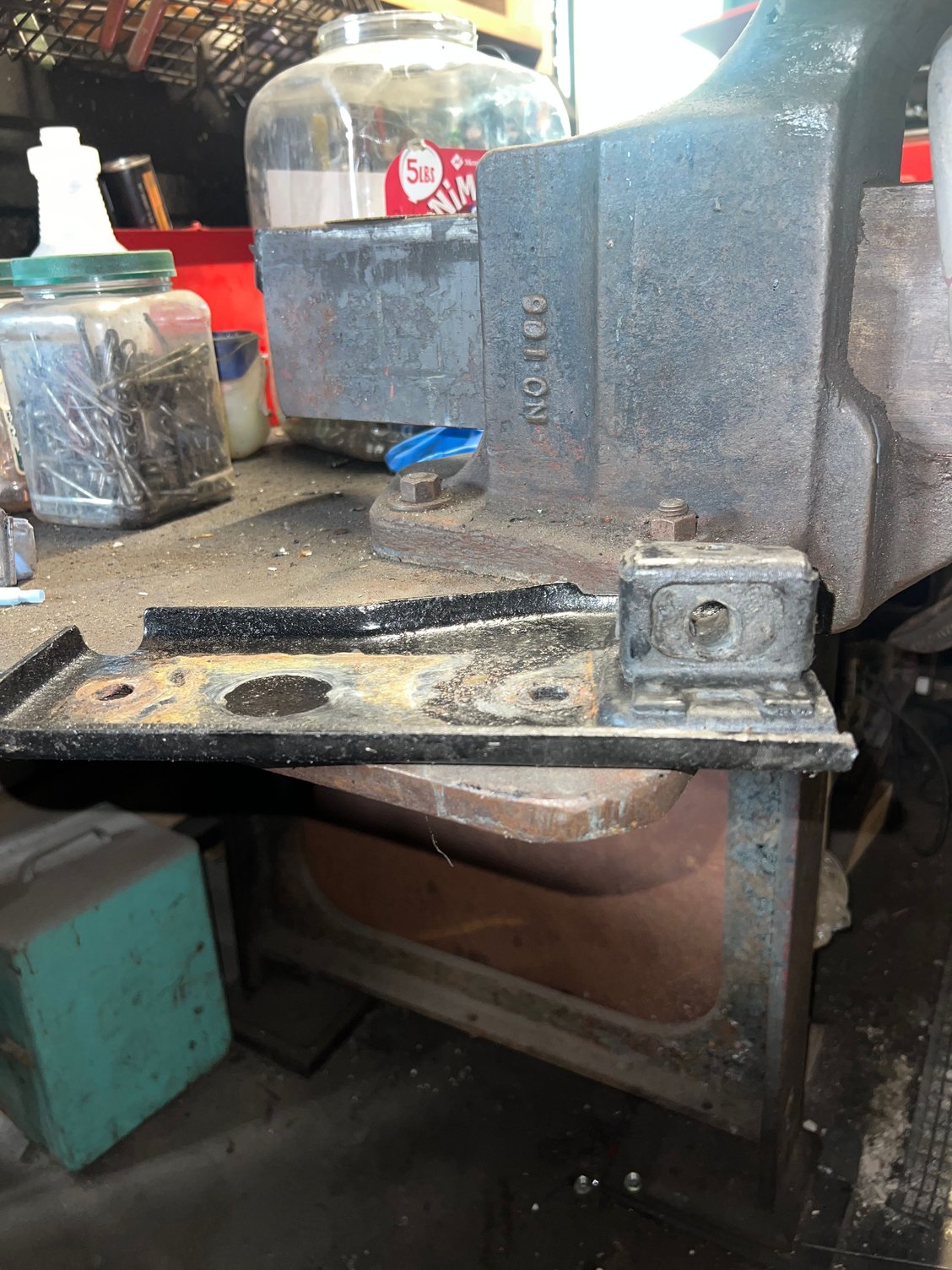 Pulled this transmission mounting plate off to address the worn out exhaust hanger bushing 