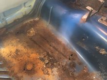Paper thin here in the passenger rear, will probably do full length mopar floor pan for this side. 
