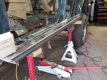 cut out the old rockers and made way for the new 2 x 6 3/16 steel rockers. this gave tons of ground clearance. plus it keeps my doors from getting crushed in.