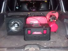 got a few new additions to the trail setup. predator 2000 generator and on board air. the compressor runs off a 400 watt inverter that will be wired in soon (prob glove box) and an outlet put in the trunk.
