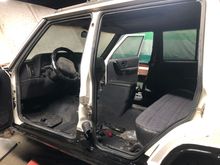 I began throwing the interior back together as well. Center console, rear seat, seat belts and pillar trim. 

I’ve made a long list of junkyard parts necessary for me to finish assembling the interior and install the rear door. I need some misc. hardware and shims for the rear door. Just waiting for the weather to warm up a bit to go out and pull parts! 