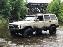 My first XJ. 4.0 auto 4x4 on a 3 inch lift. 