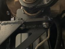 Here’s a picture of the steering box brace. Not only does this brace the sector shaft area, but also boxes in with the side plate that the 3 steering box bolts go thru!