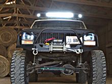 The bumper is on and the 12k lbs winch is hooked up. The bumper is the DIY dirtbound off-road front winch bumper. It was really easy to set up and weld together.