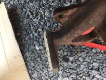 This is a shot of the bottom of knuckle,showing the ridge where the notch in the brake pad rides.