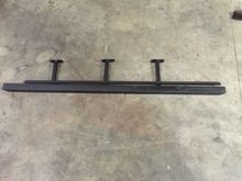 Finished making the rock sliders. 2 inch tube for the part you see. It is 63 inches long and has 30 degree cuts on the ends and has caps. Rocker tie in is 57 inches long and made from 1 inch angle iron with 8 bolts holding it on.3 mounting legs from 1 inch tube with mounting plates and self tapping bolts.