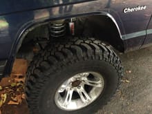 1st jeep cherokee 3 in Rough Country lift, 33 in BFG Tires, and Bushwacker fenders