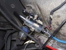 Mounted fuel pump and filter in an "outta the way" spot. drive side just in front of the  rear axle.